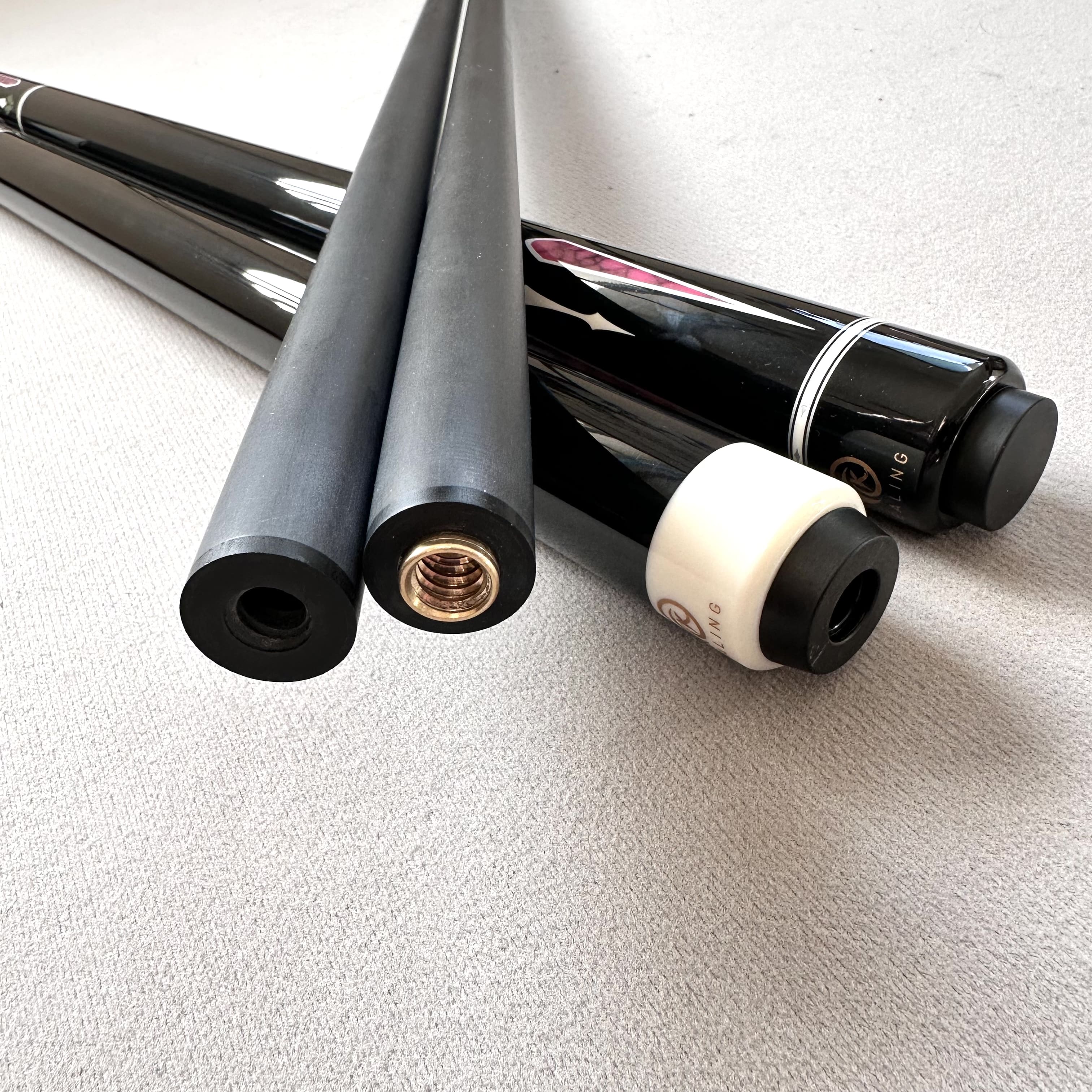 Close-up of a carbon fiber break cue shaft