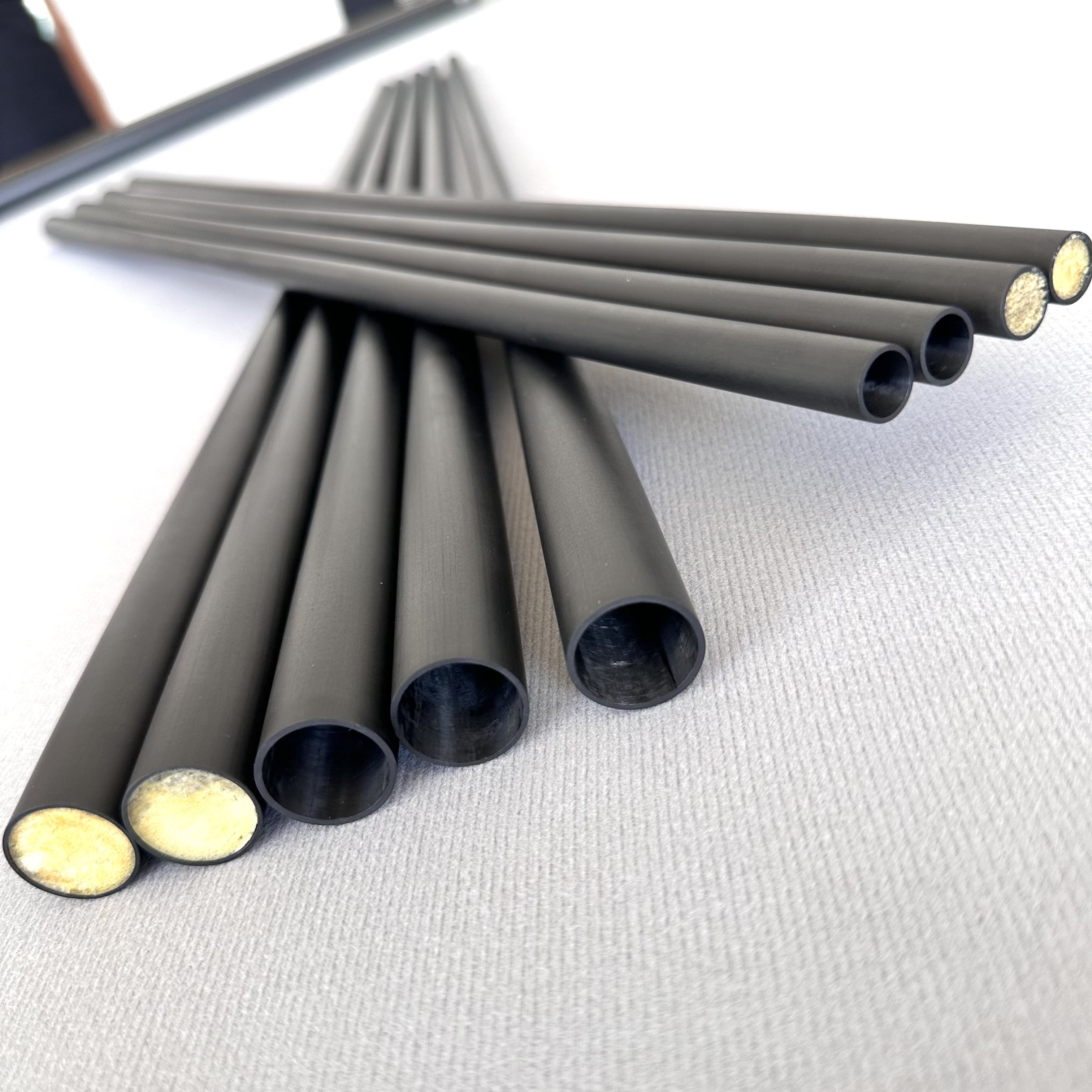 Player using a sleek carbon fiber pool cue