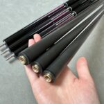 Carbon fiber pool cues on display