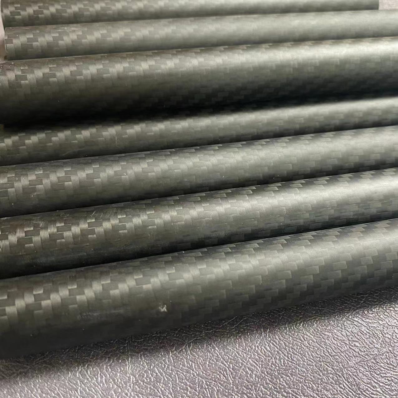 Comparison of pultruded and roll wrapped carbon fiber manufacturing processes